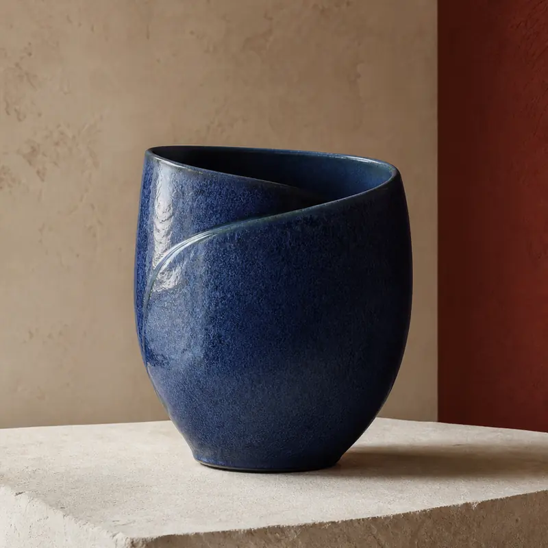Close view of a cobalt-blue folded vessel surface